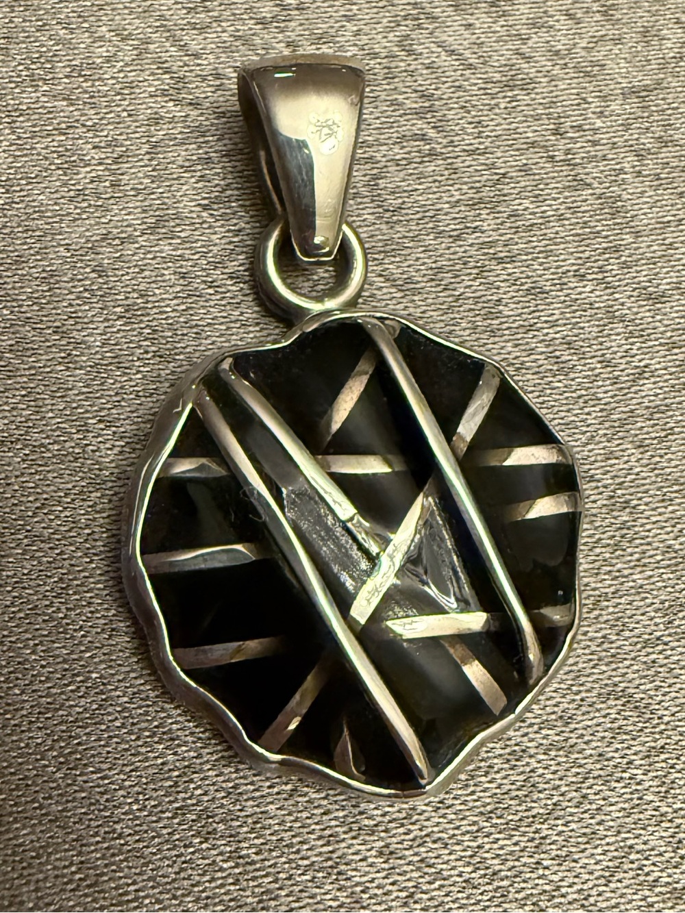 Charles Albert Black and Silver Striped Enamel Pendant